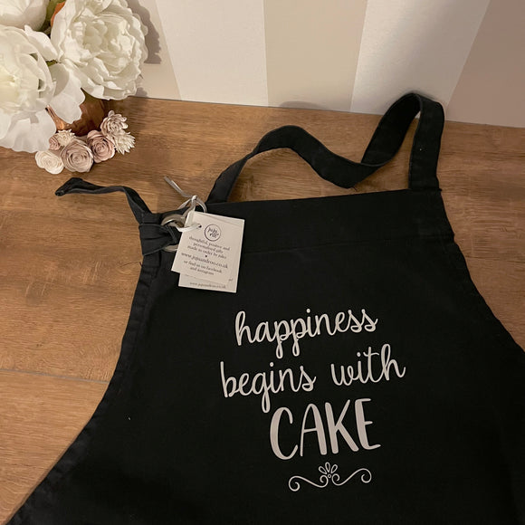 happiness begins with cake - black and silver apron